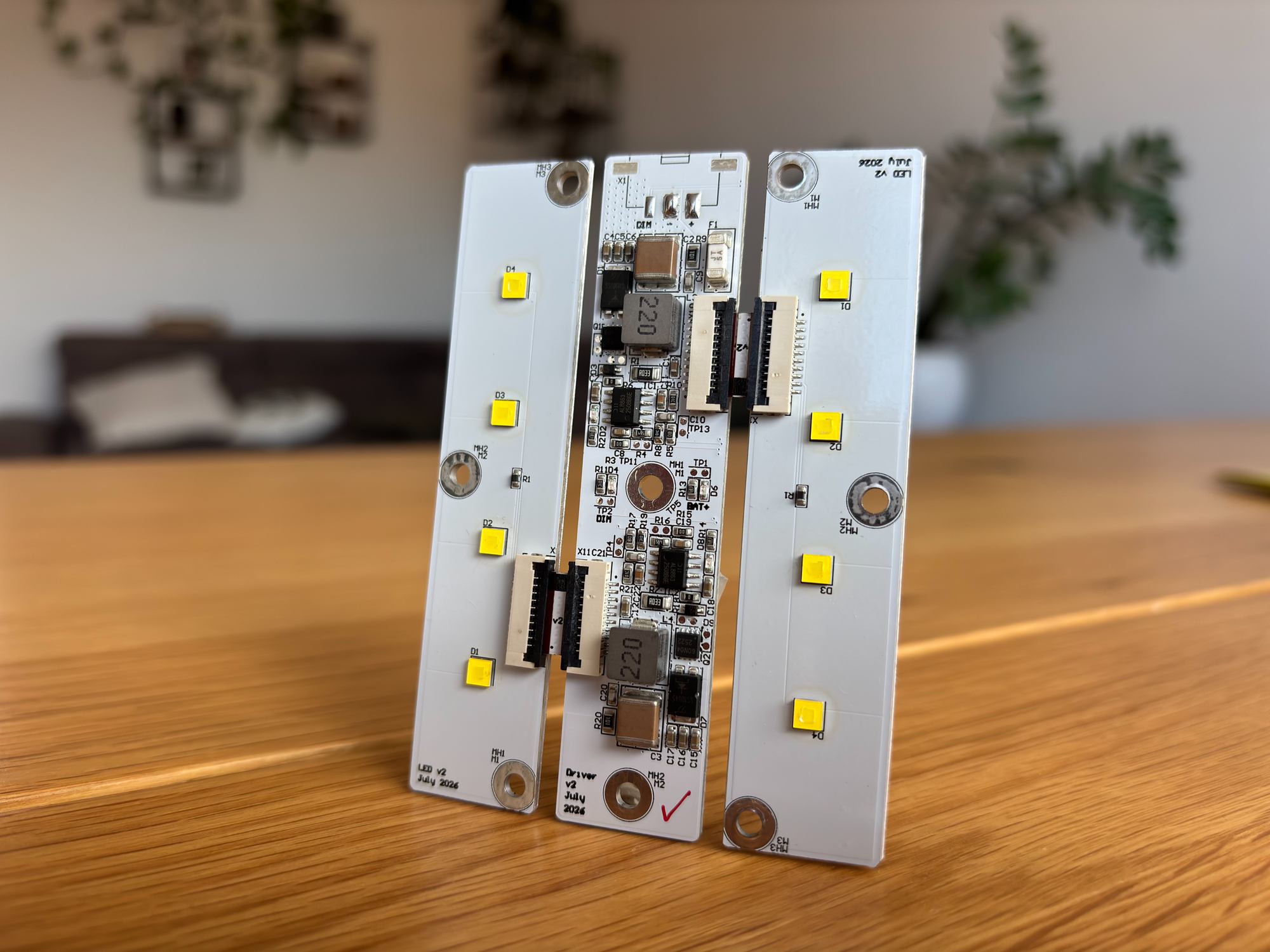 LED and driver board stack for a high-power deep-sea light, showing the metal-core PCB driver between two LED strips