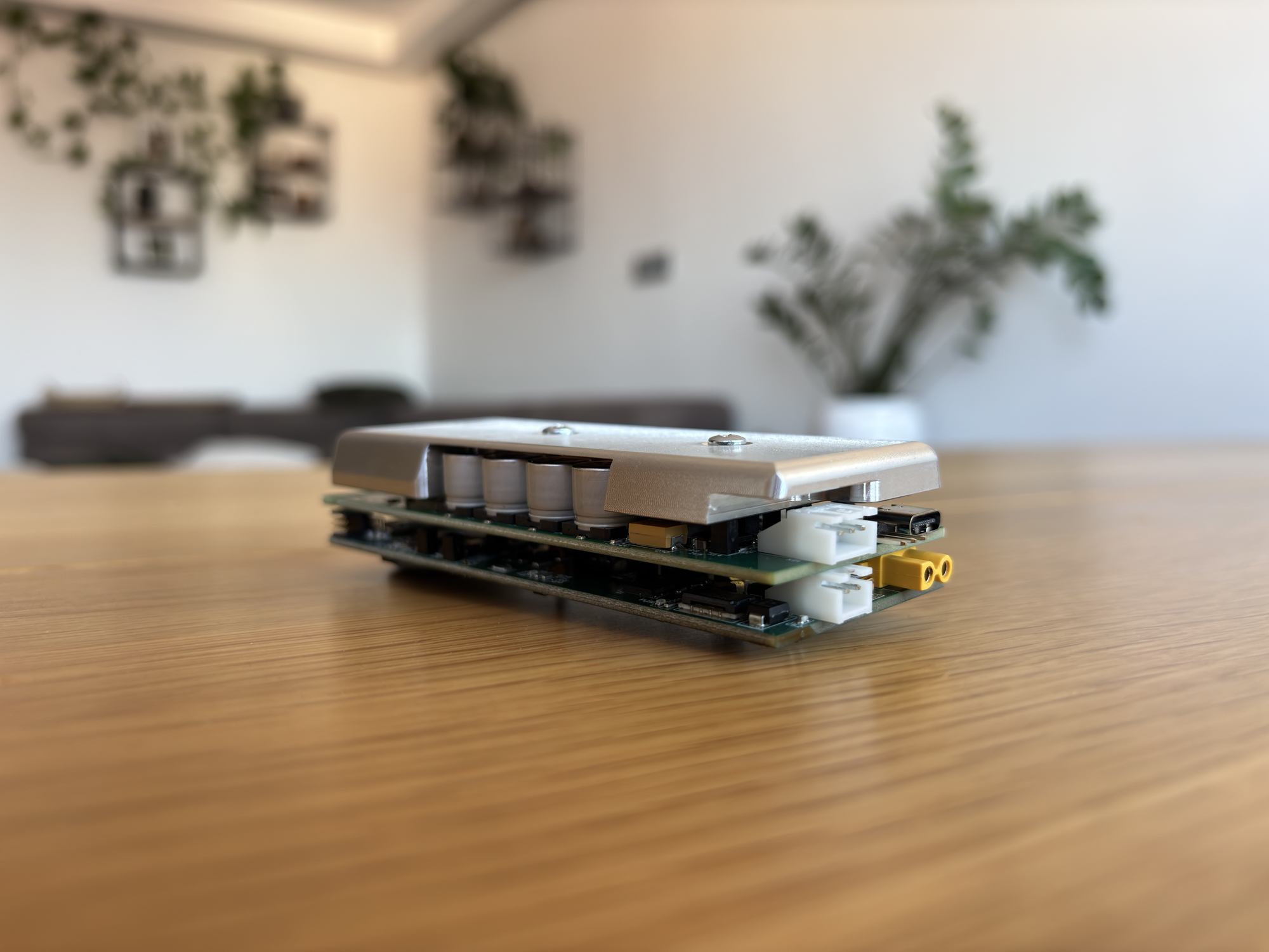 Compact, integrated battery charger and BMS module stack for a high-end electric road bike